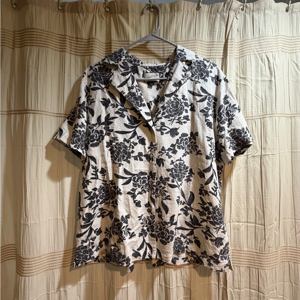 Black Floral Button-Up Shirt on Cream Background